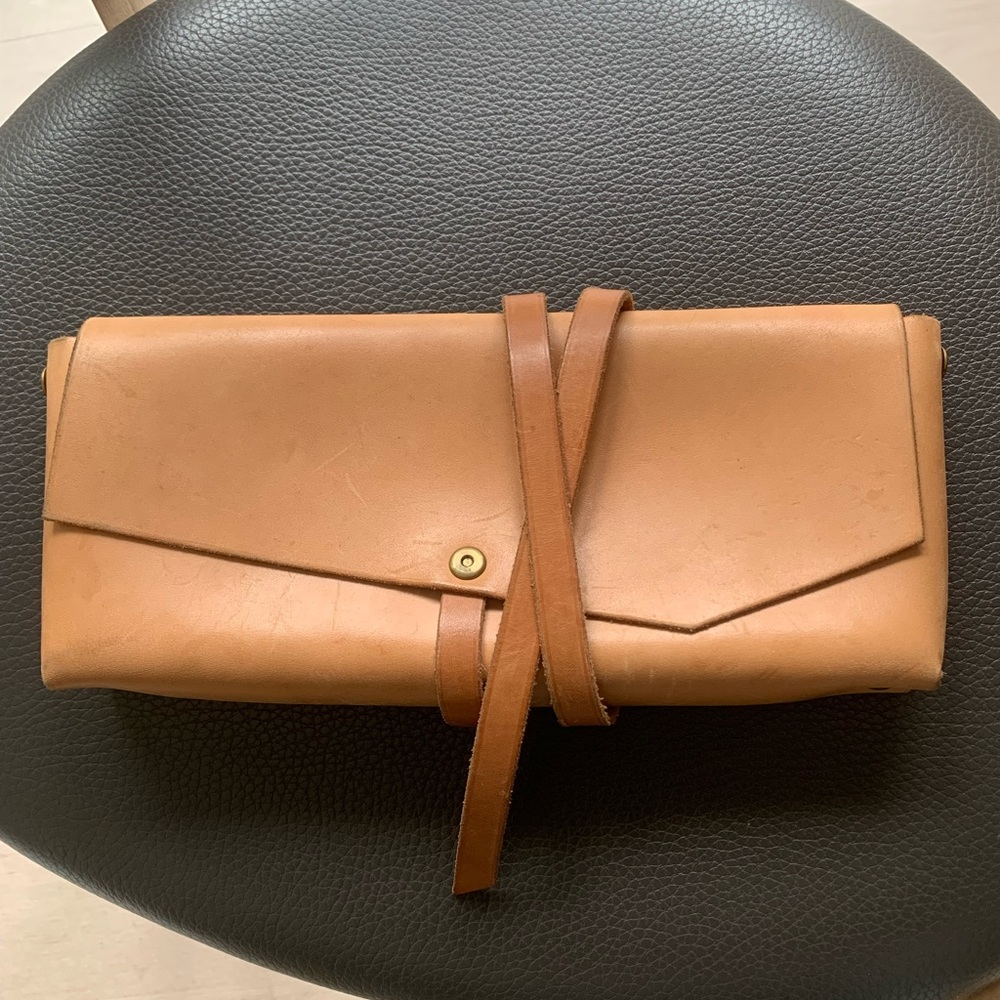 Vintage hand made natural Leather Clutch with wrap around closure